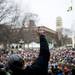 A Hash Bash attendee holds up a peace sign during one of the speakers on Saturday, April 6. Daniel Brenner I AnnArbor.com